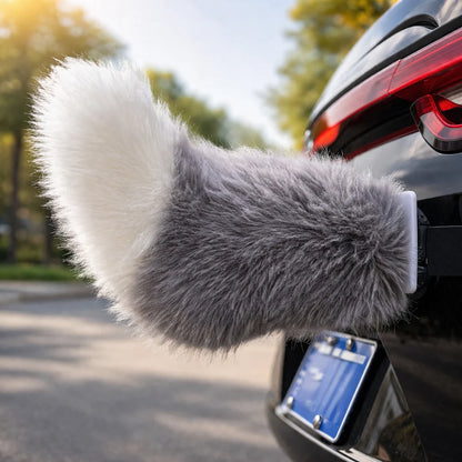 Gray moving tail accessory attached to a car