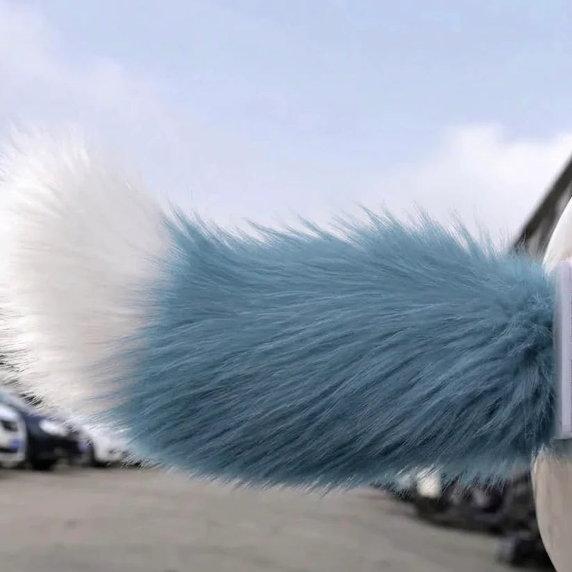 Blue moving tail accessory attached to a vehicle