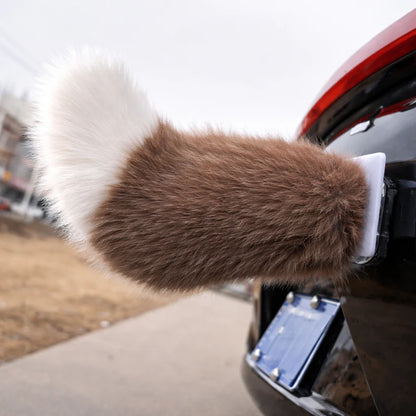 Brown moving tail accessory attached to a car