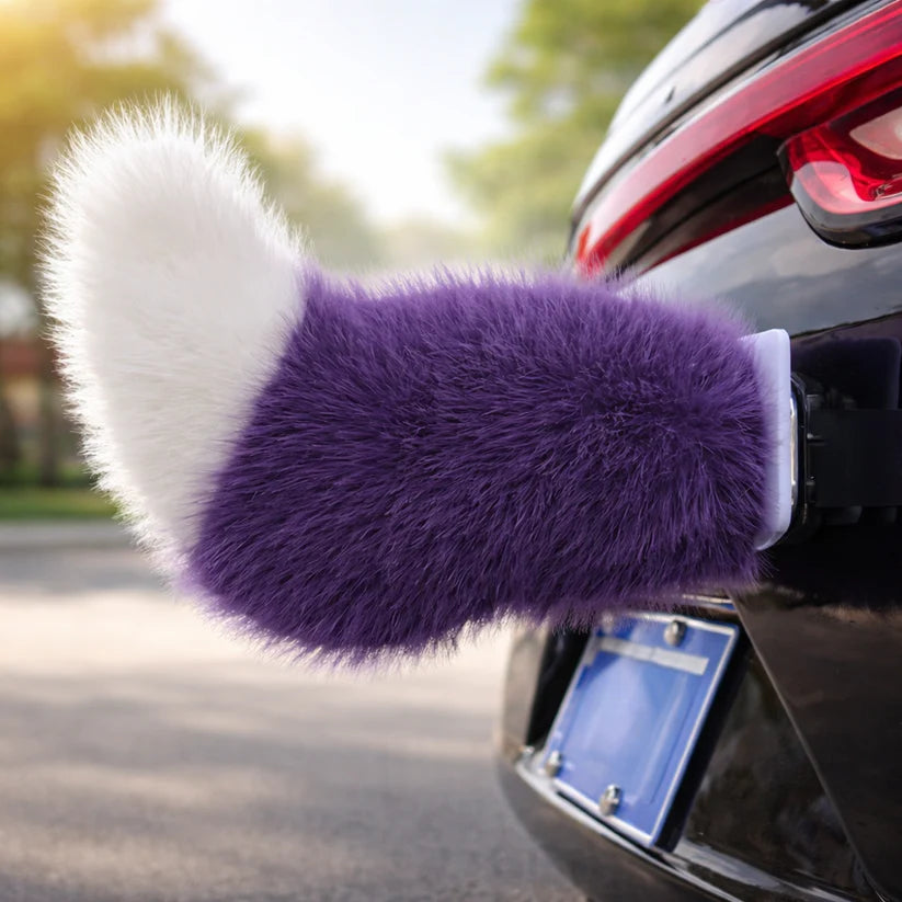Purple moving tail accessory attached to a car