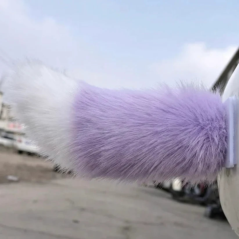 Taro moving tail accessory attached to a vehicle